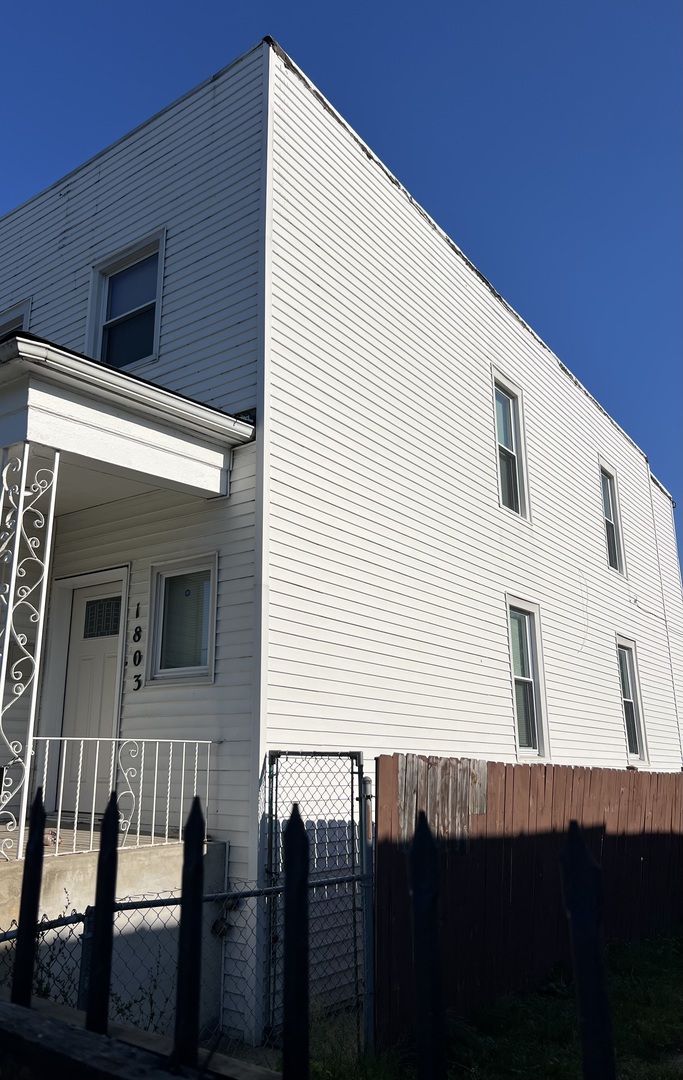 a view of a house with a balcony