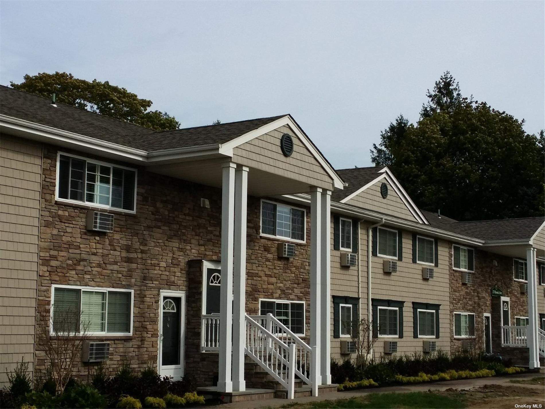 a front view of a house with balcony