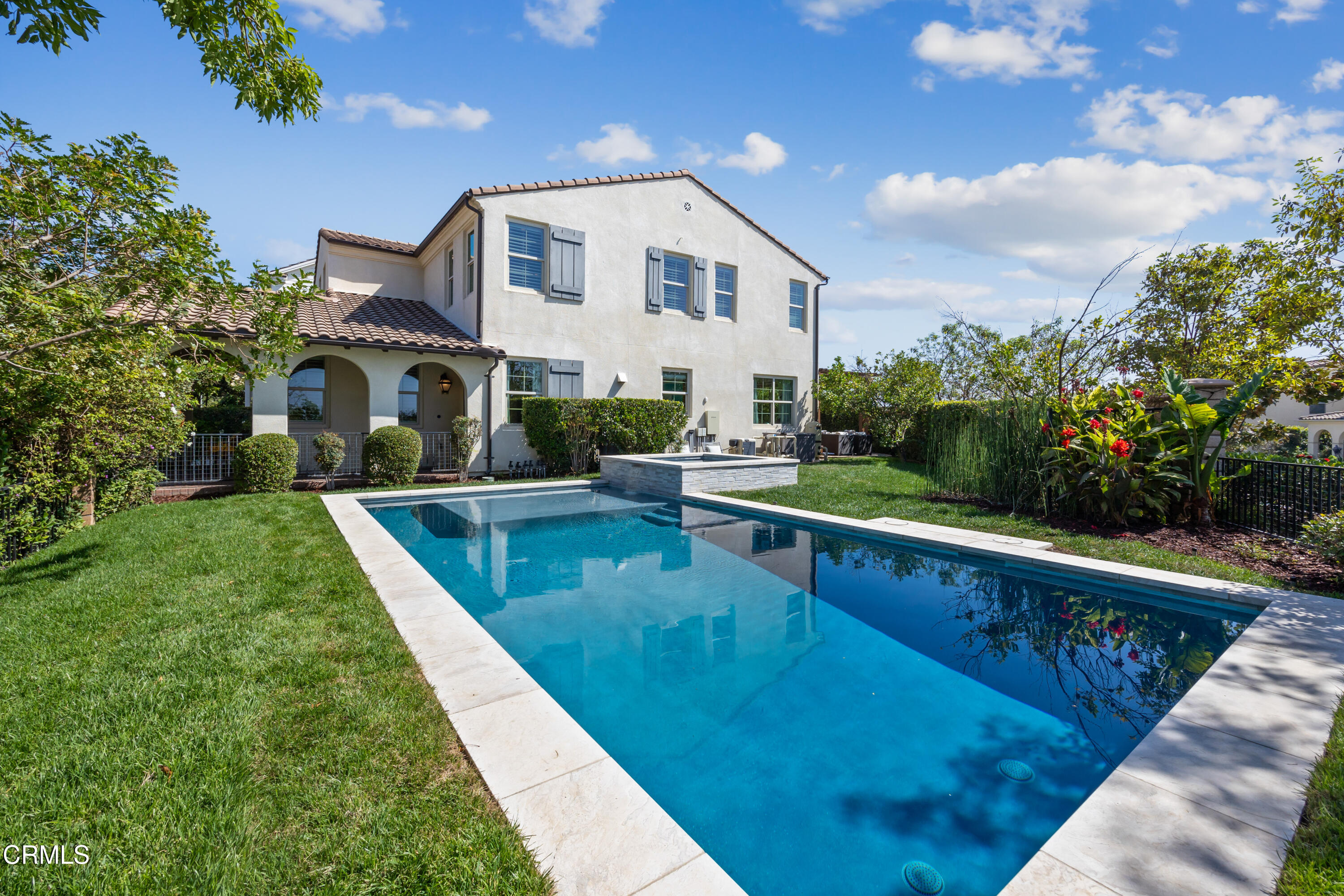 a view of house with swimming pool