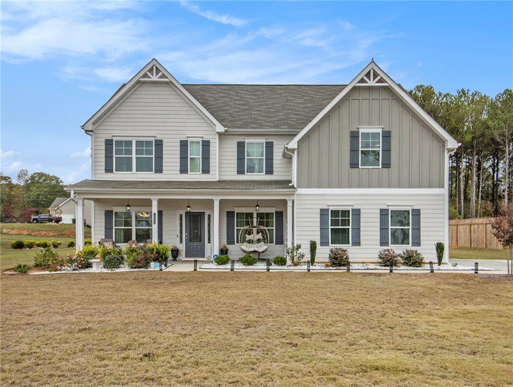 a front view of a house with swimming pool