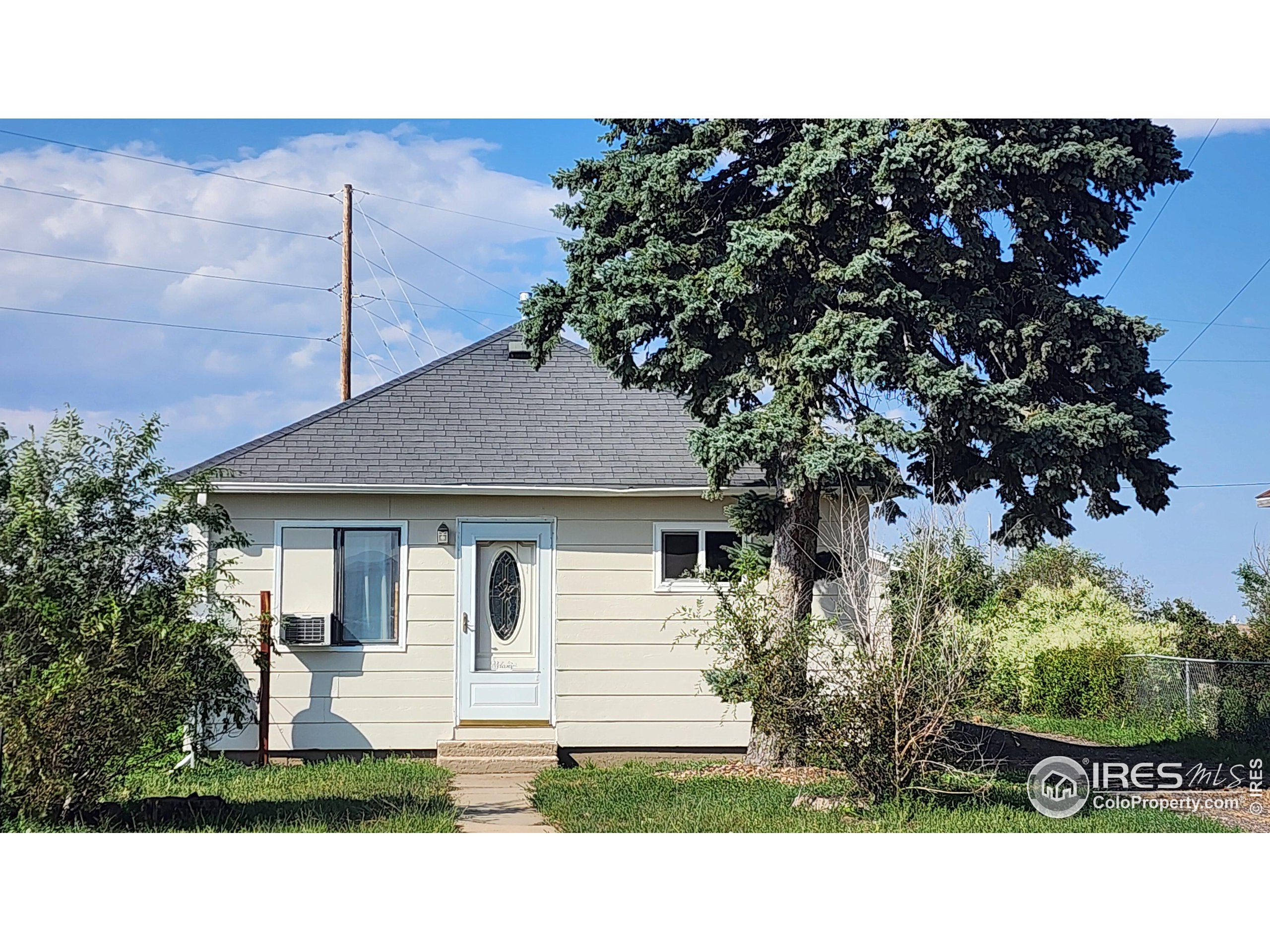 a black and white photo of a house