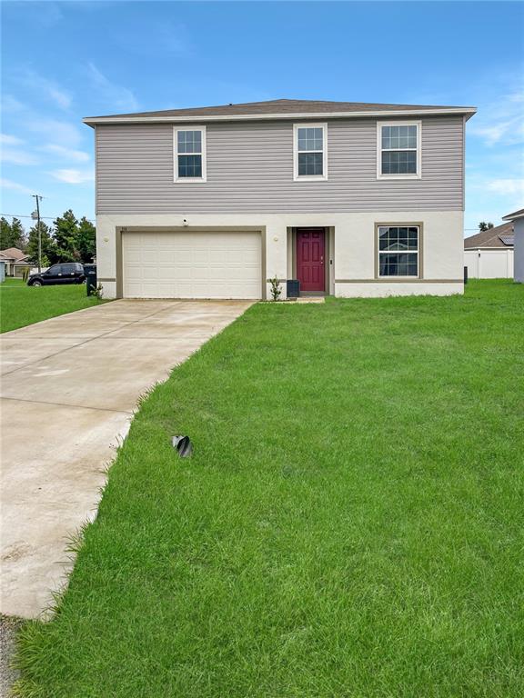 a house view with a garden space