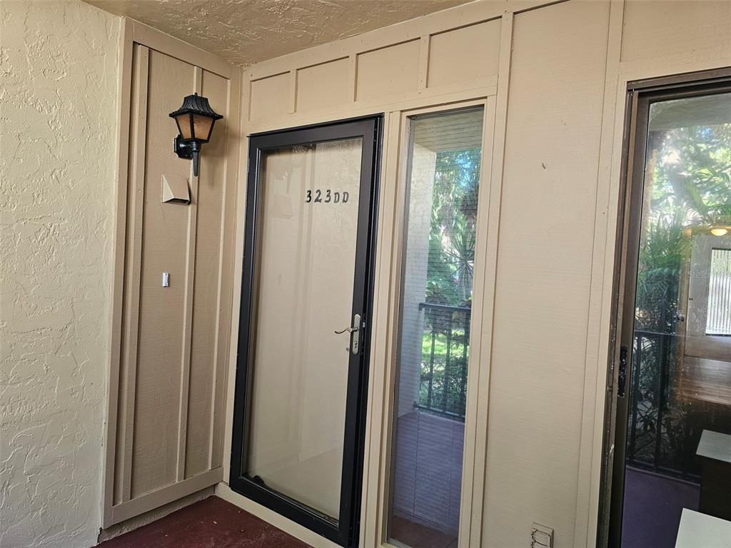 a view of a bathroom from a hallway