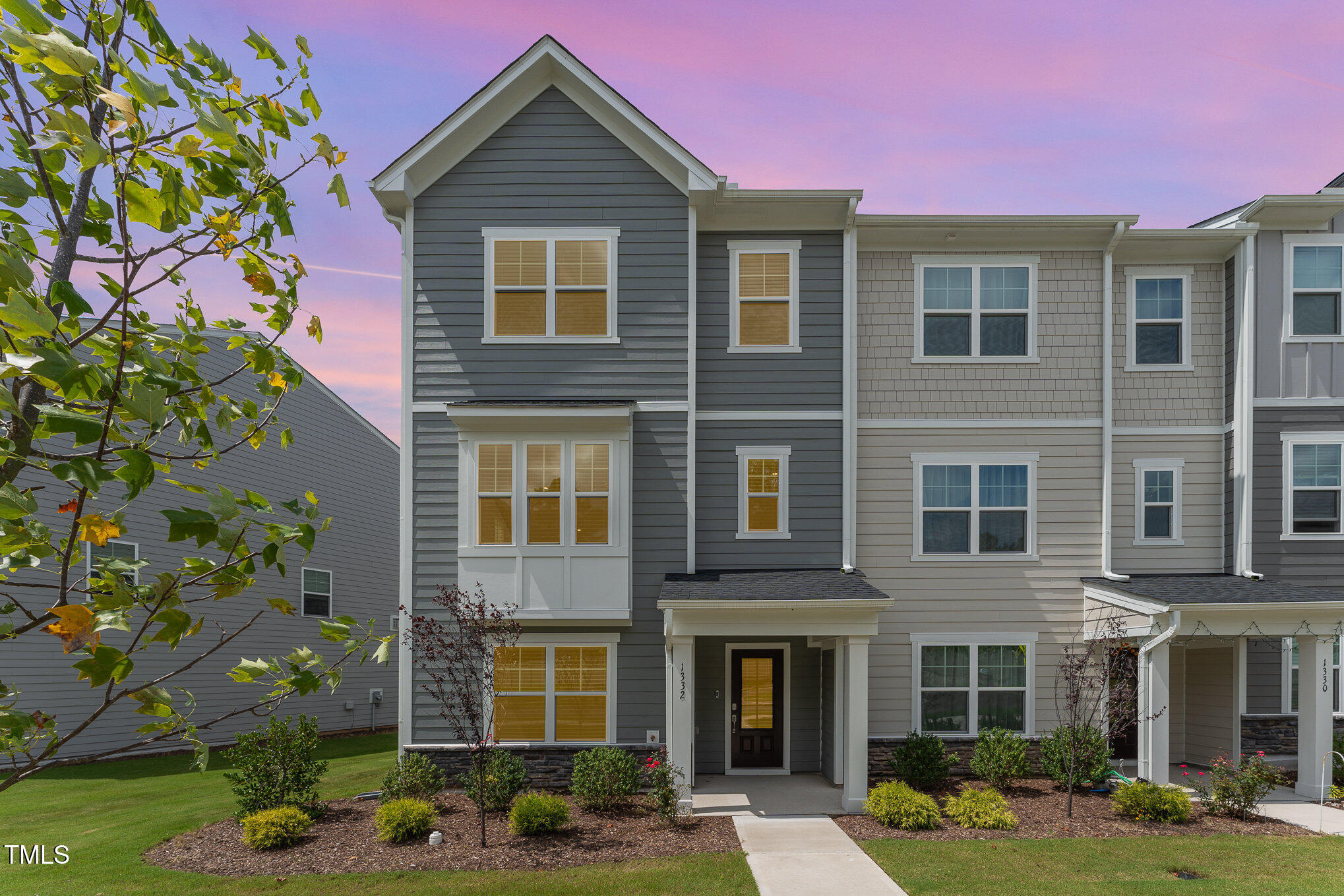 a front view of a multi story residential apartment building