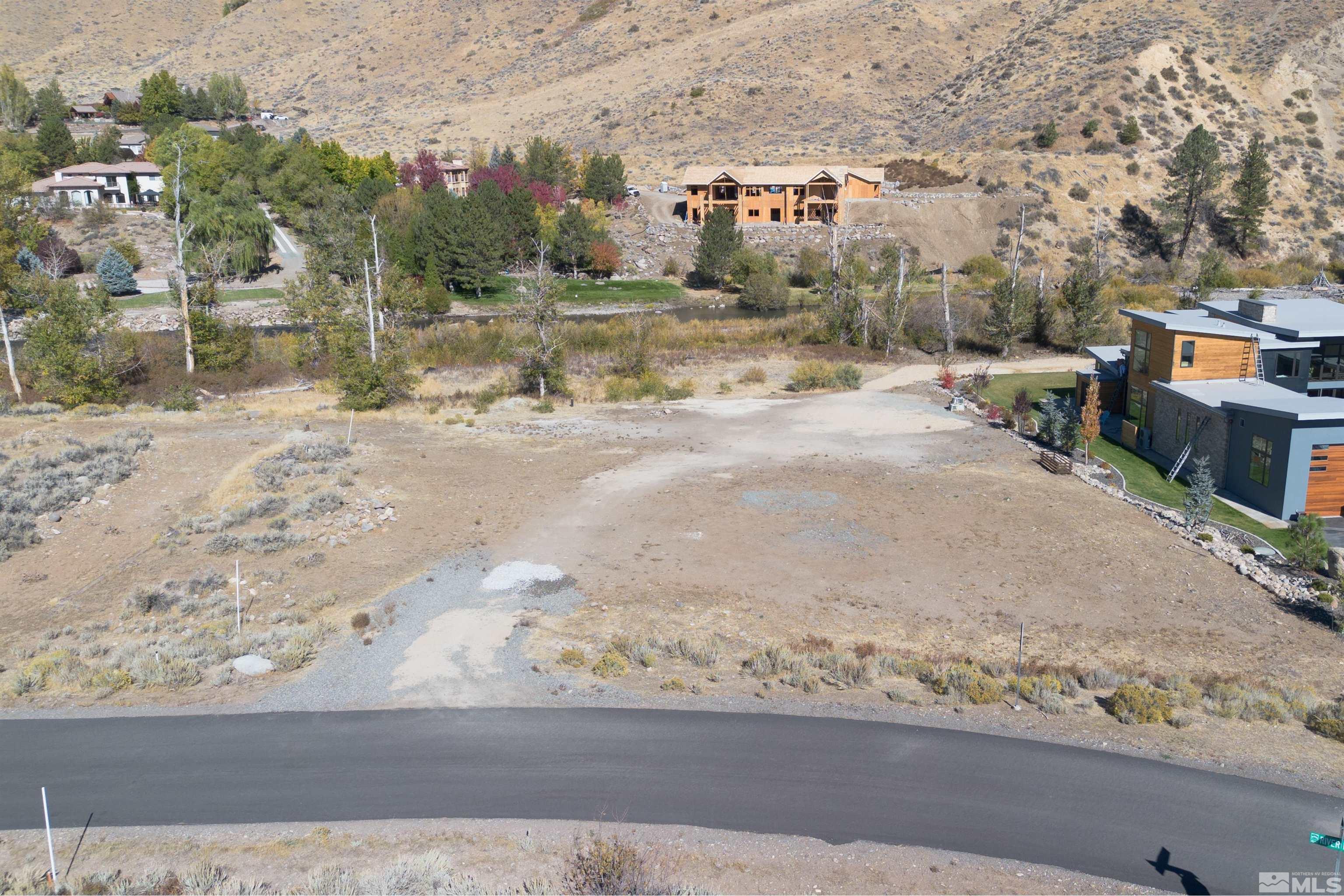 a view of a road with a big yard