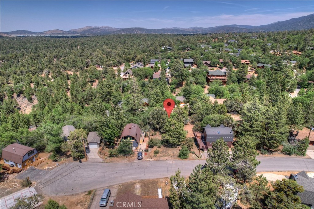 an aerial view of residential house with outdoor space