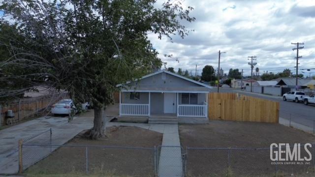 a view of a house with a garden