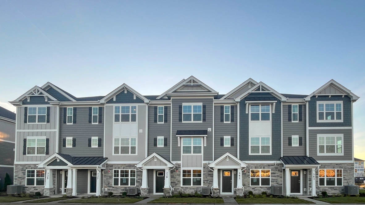 a front view of a residential apartment building with windows