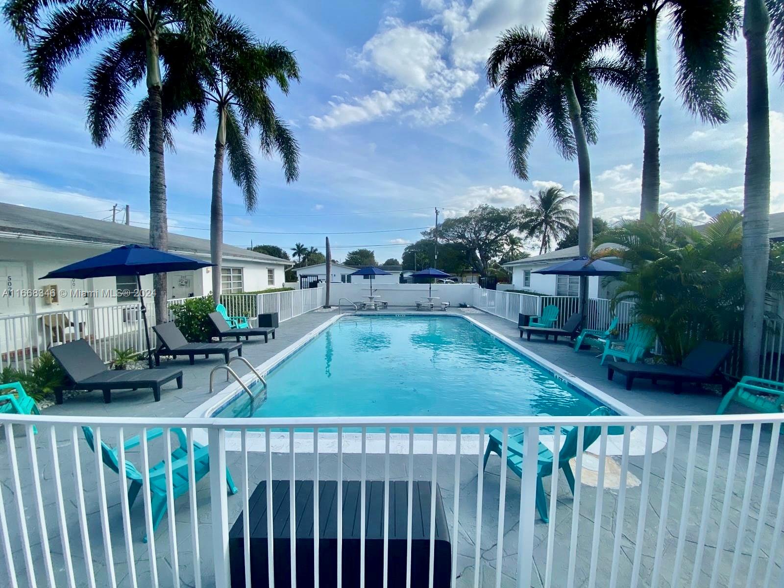 a view of outdoor space and swimming pool