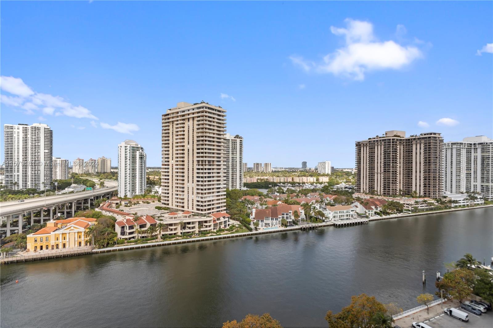 a view of a city with tall buildings