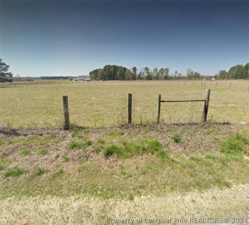 a view of a lake with a big yard