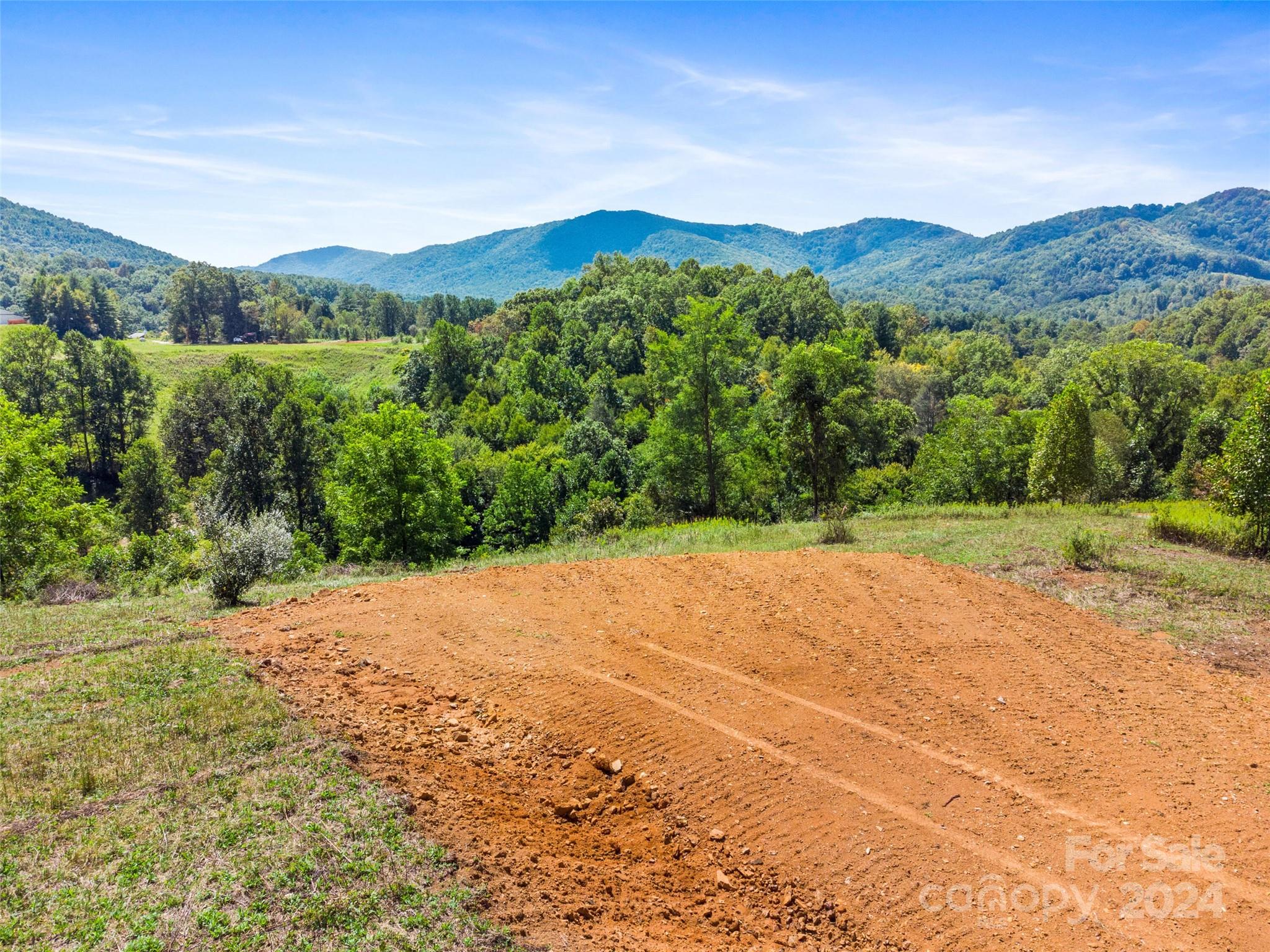 a view of an outdoor space with mountain view