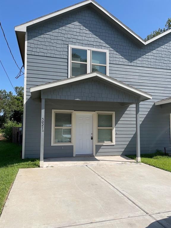 a front view of a house with a garage