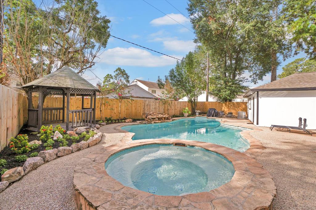 a house view with a backyard space