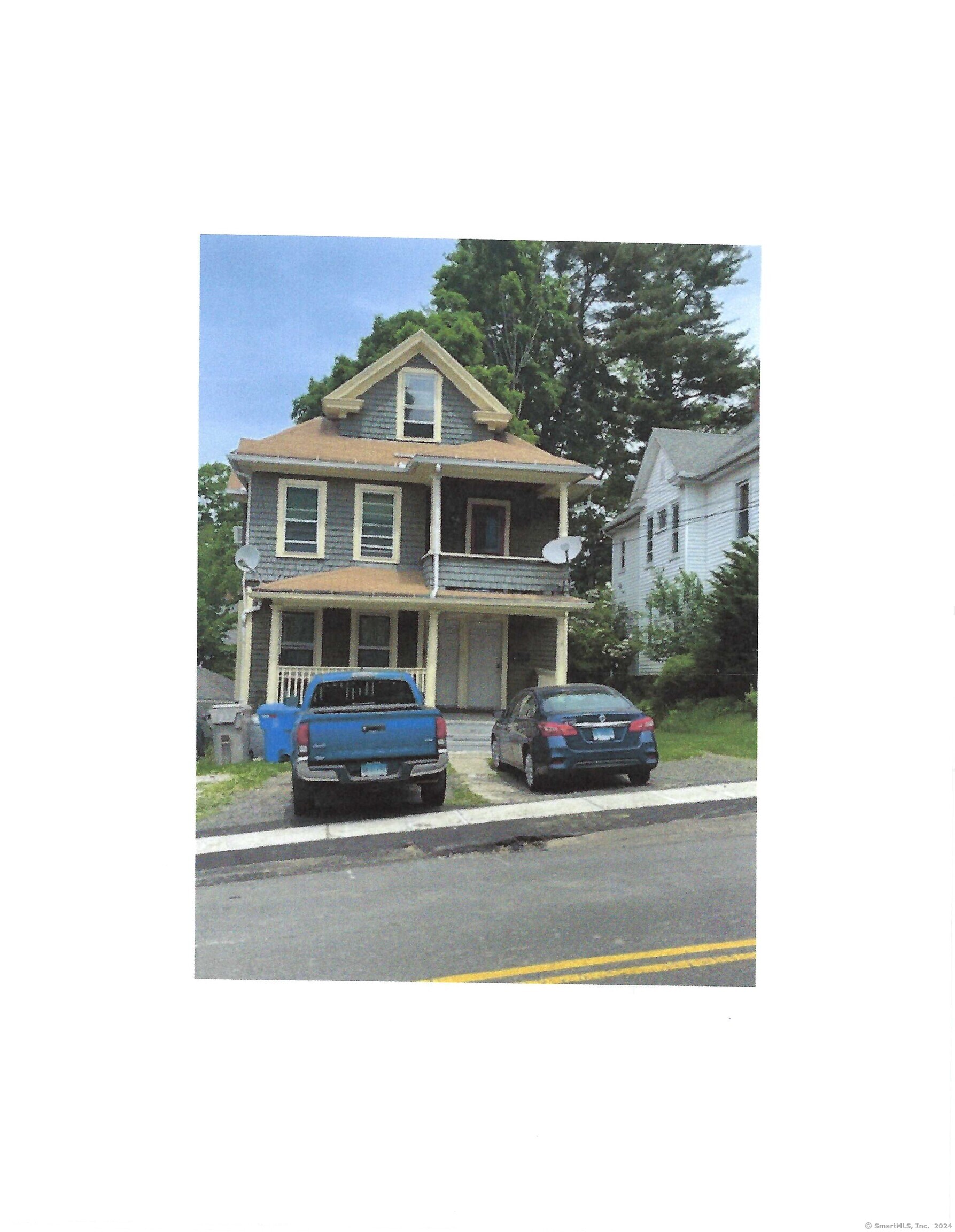 a front view of a house with a porch