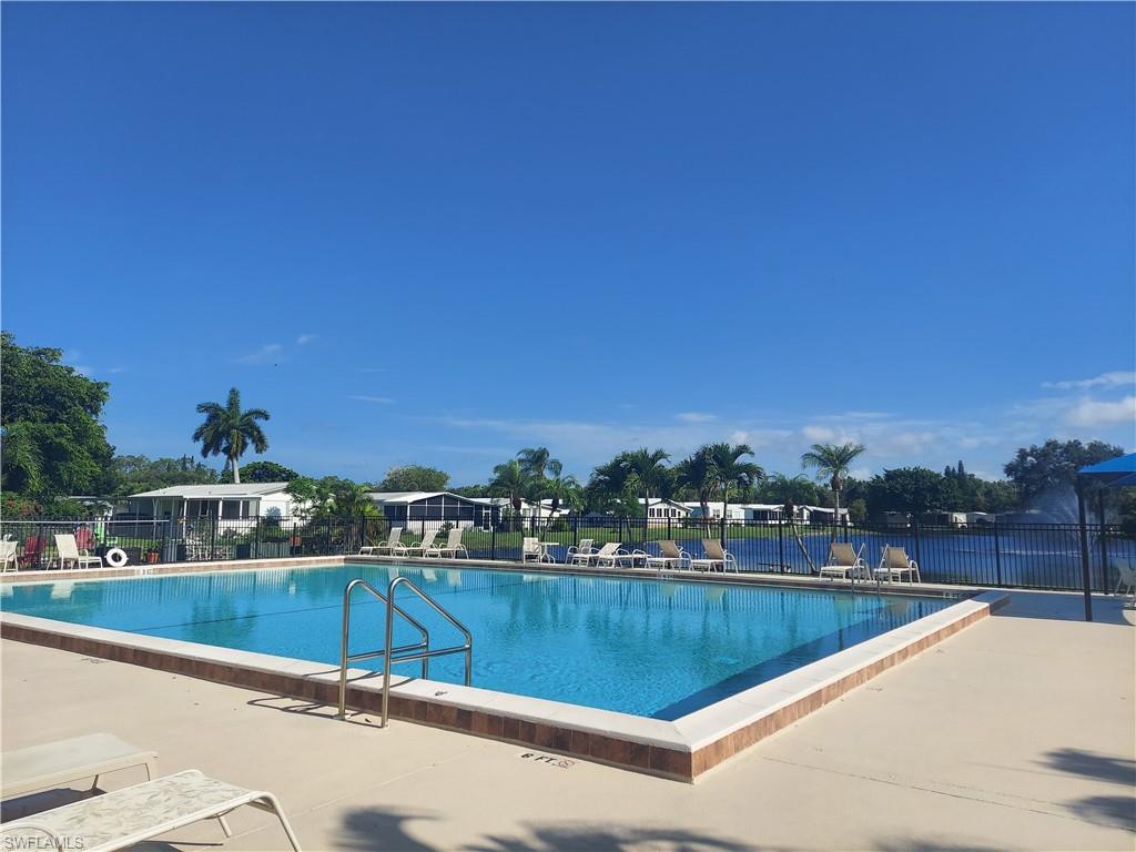 View of swimming pool with a patio area