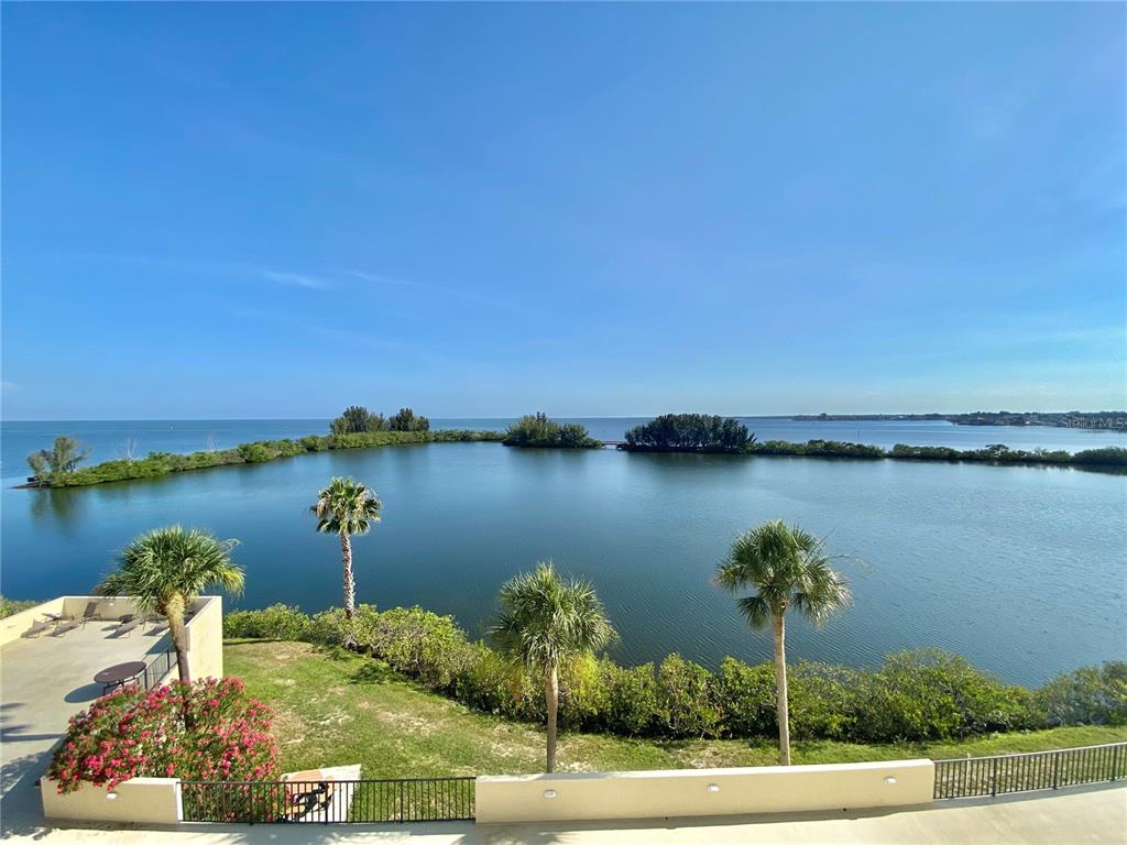 a view of a lake from a balcony