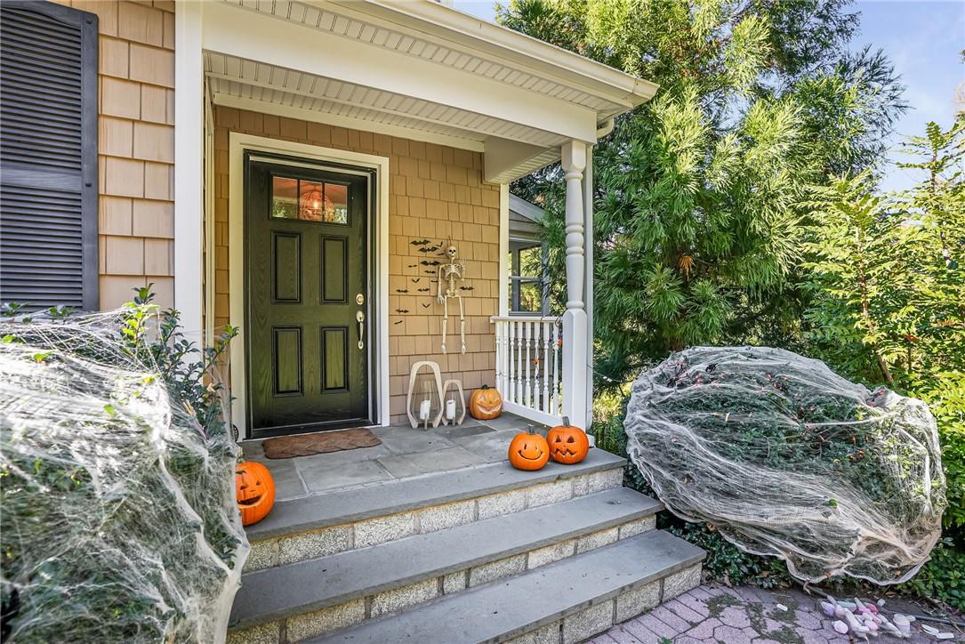 Entrance to property with covered porch