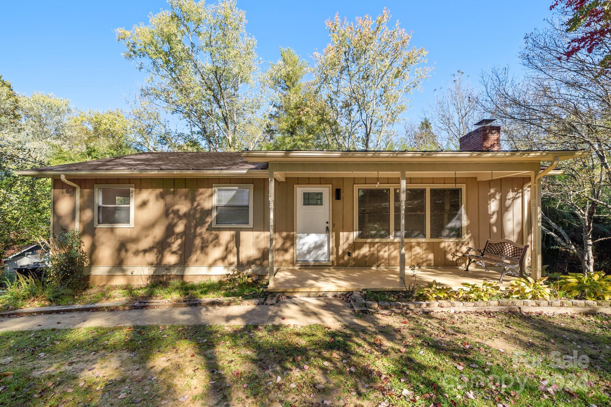 front view of a house with a yard