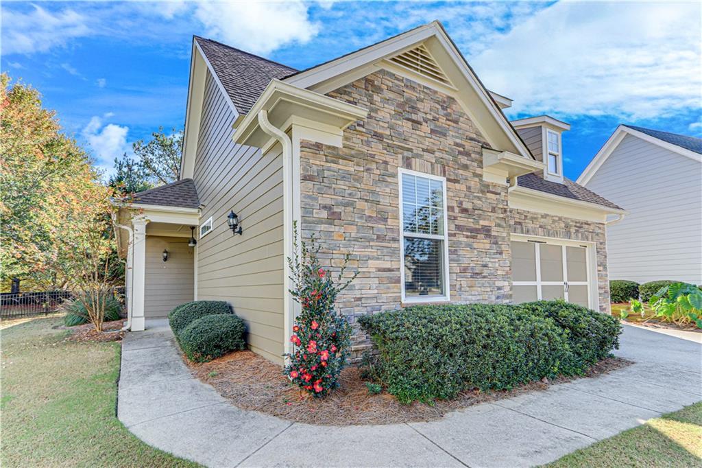 front view of a house with a yard