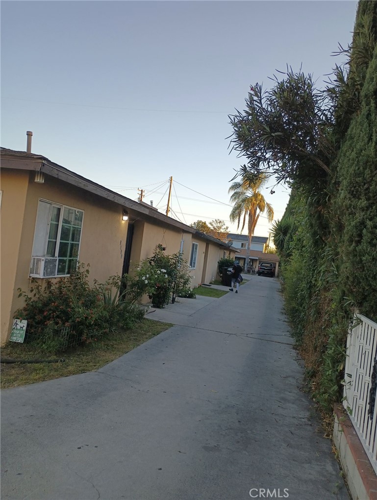 a road view with a house