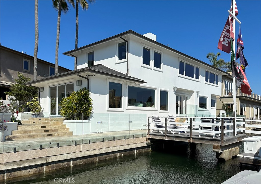 a front view of a house with swimming pool