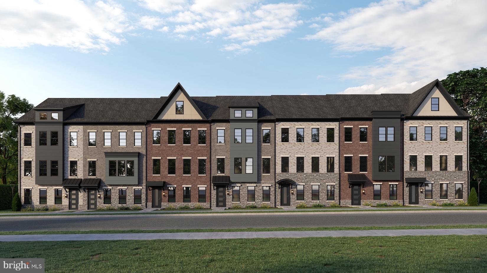 a front view of a building and a yard