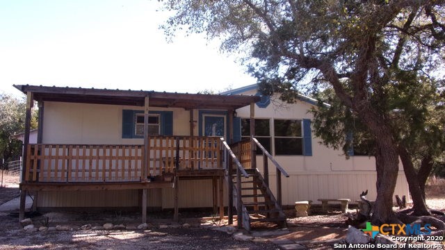 a front view of a house with a balcony