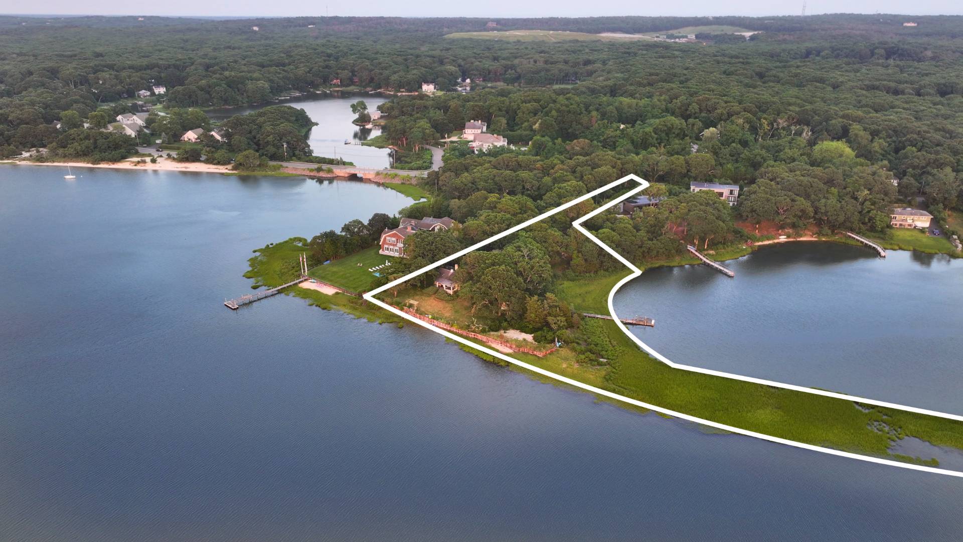 an aerial view of a house with a swimming pool