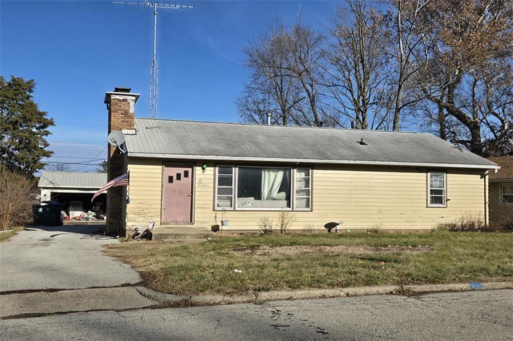 a front view of a house with garage