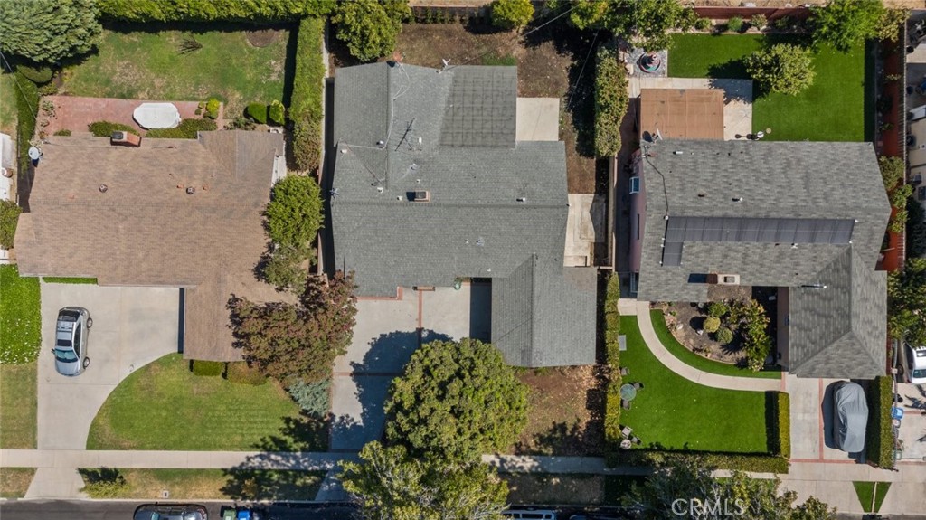 an aerial view of a house with garden space