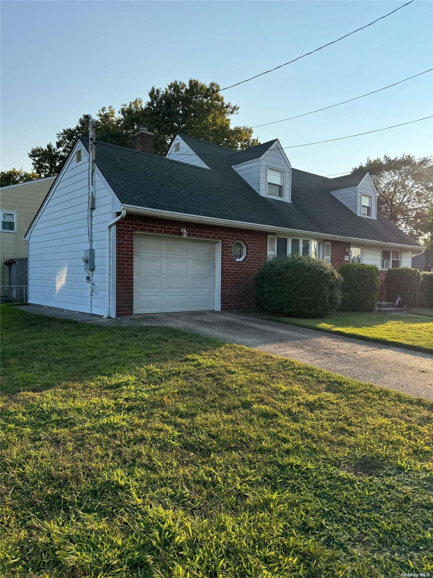 a front view of house with yard