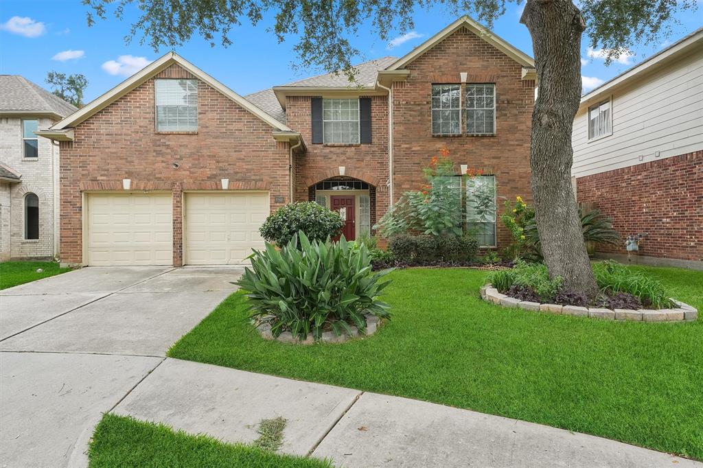 Traditional family home sits near a culdesac