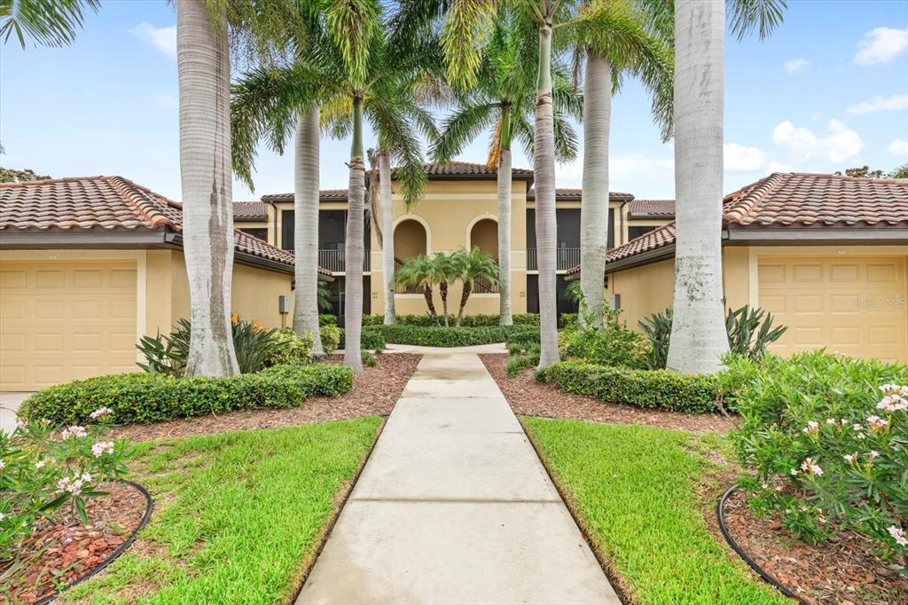 a view of multiple house with a yard