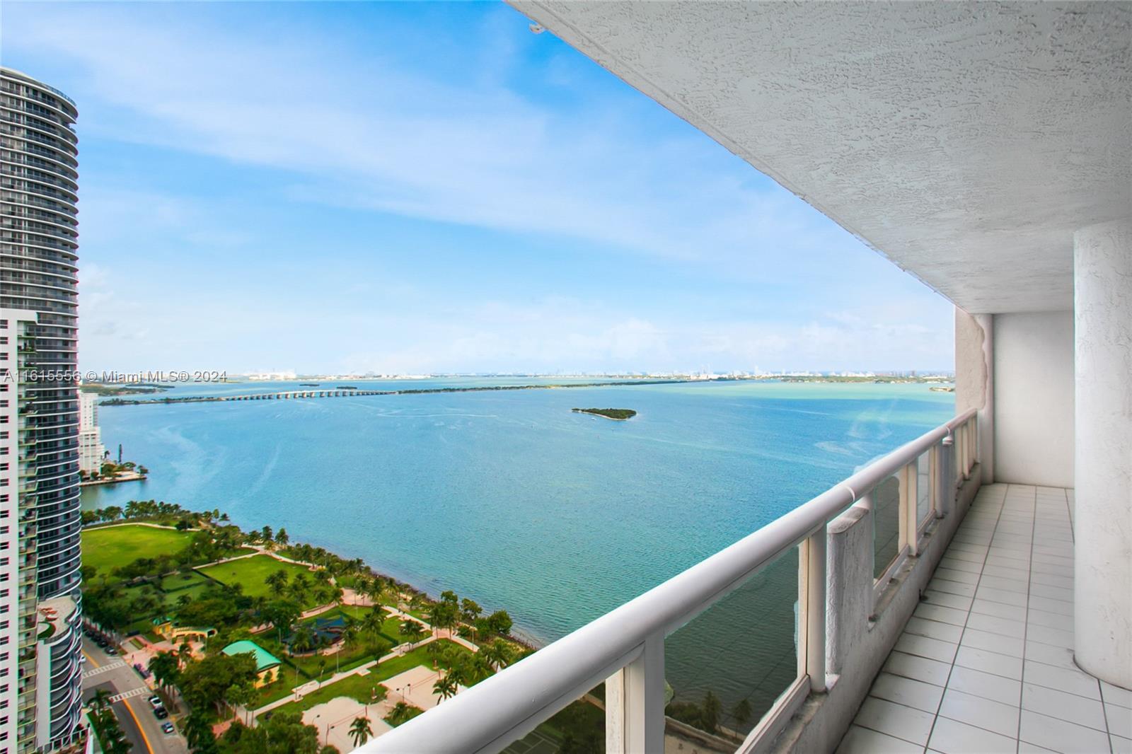 a view of a balcony with an ocean view