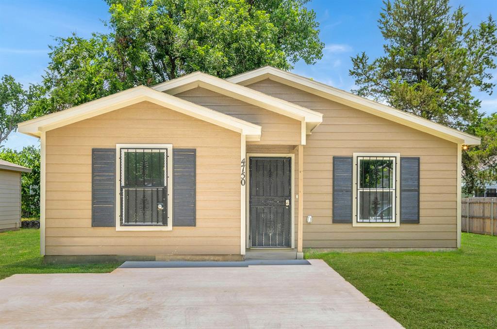 a front view of a house with a garage