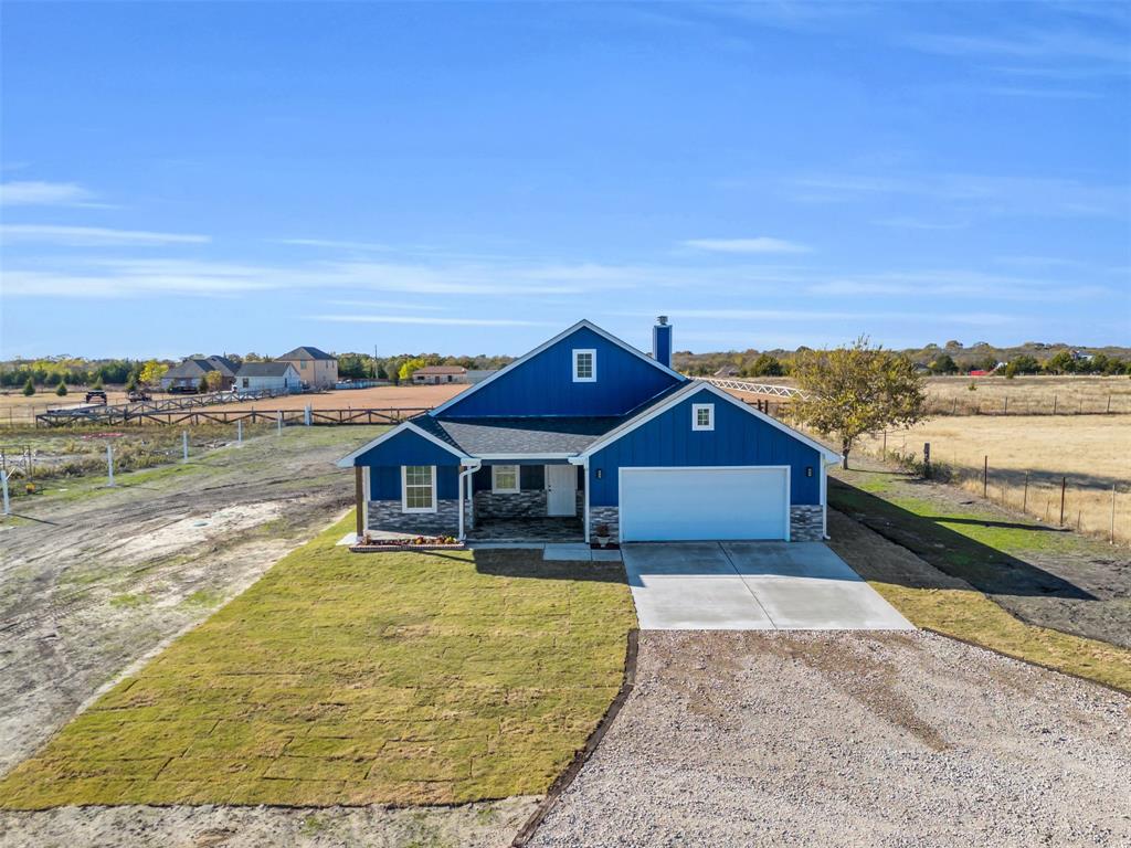 a front view of a house with a ocean view