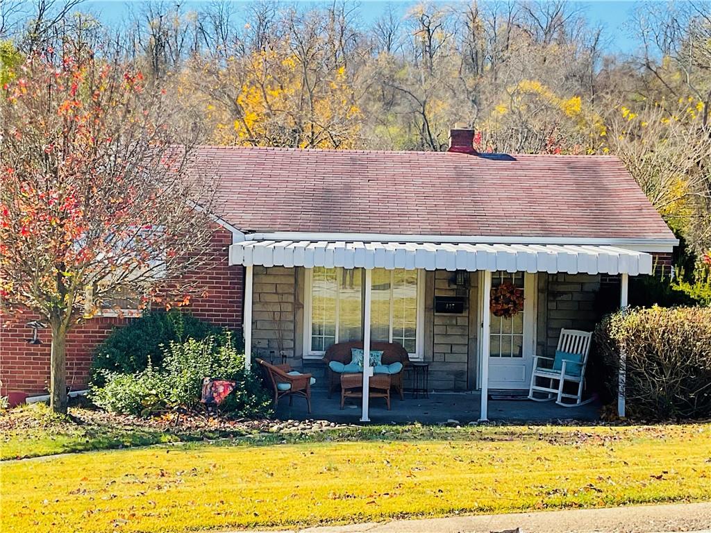 a view of house with outdoor space