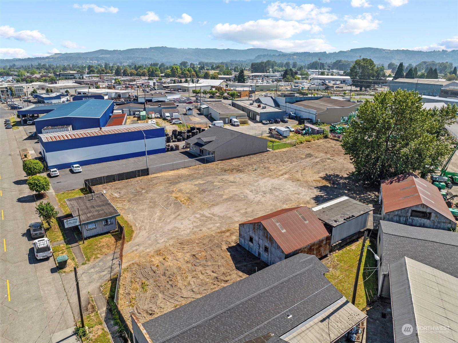 an aerial view of a house with outdoor space