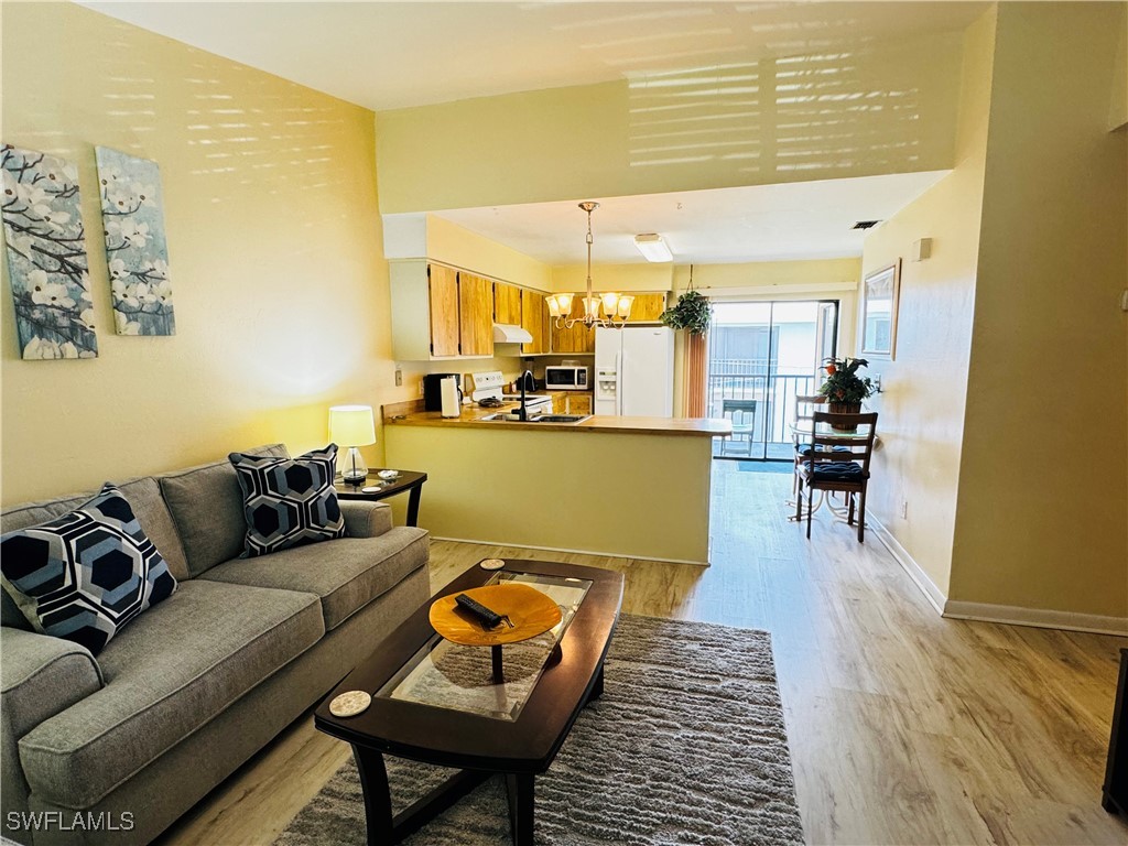 a living room with furniture and a table