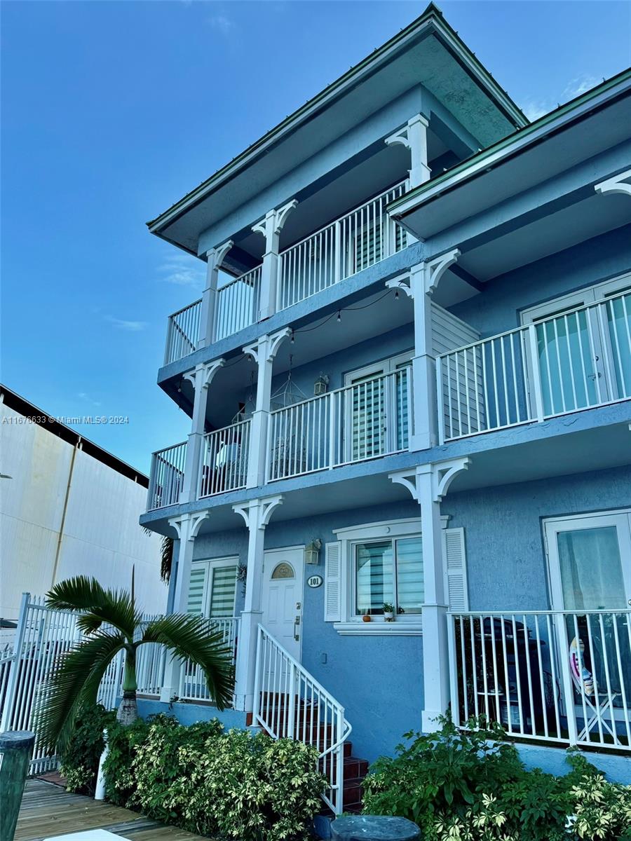 a front view of a house with balcony