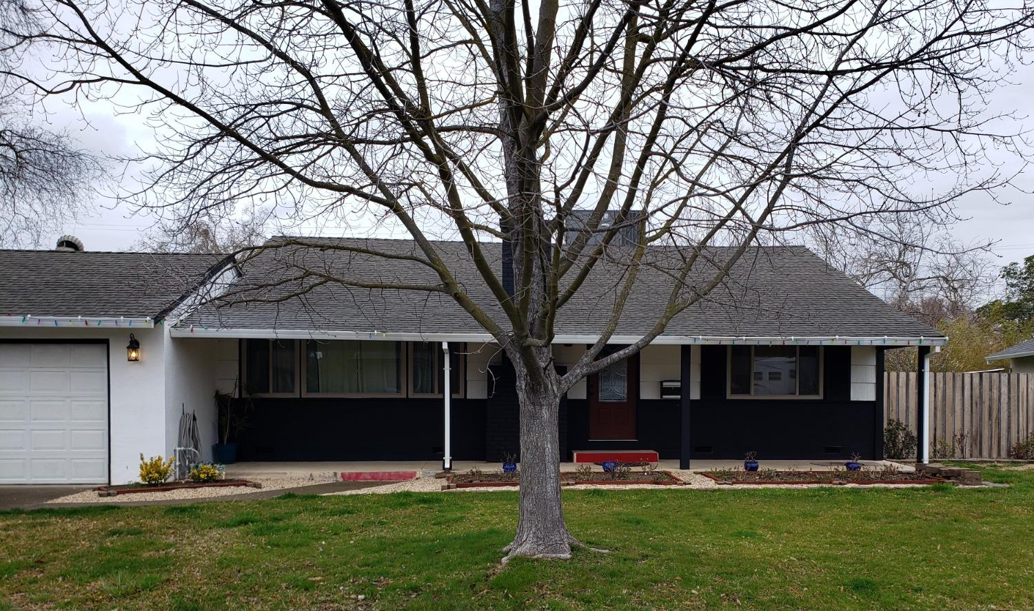 a front view of house with yard