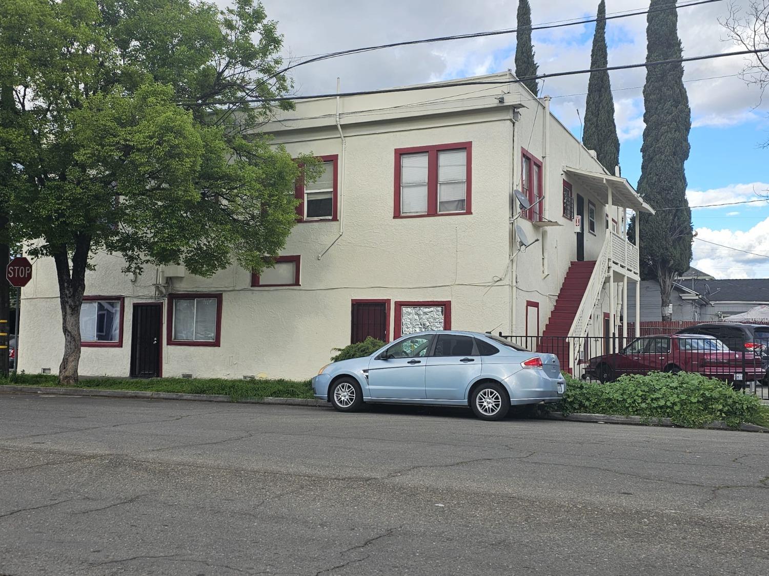 a car parked in front of a house