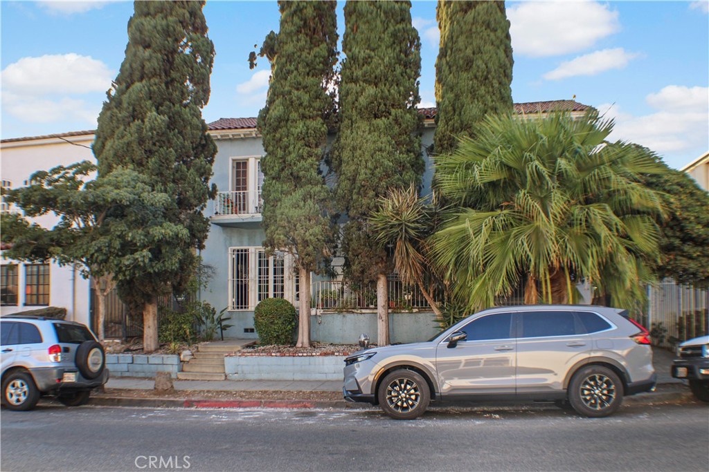 a car parked in front of a house