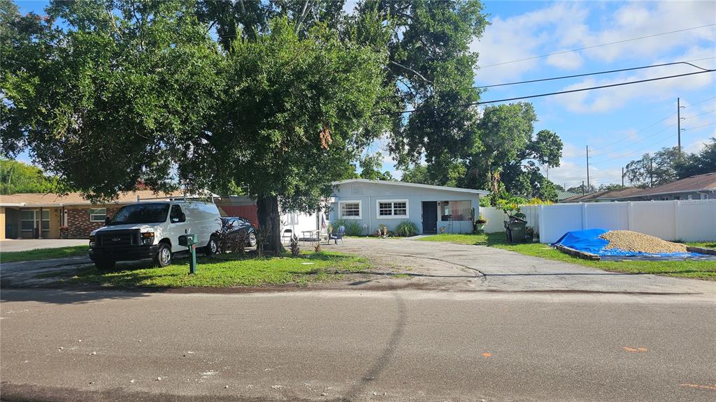 a house with trees in front of it