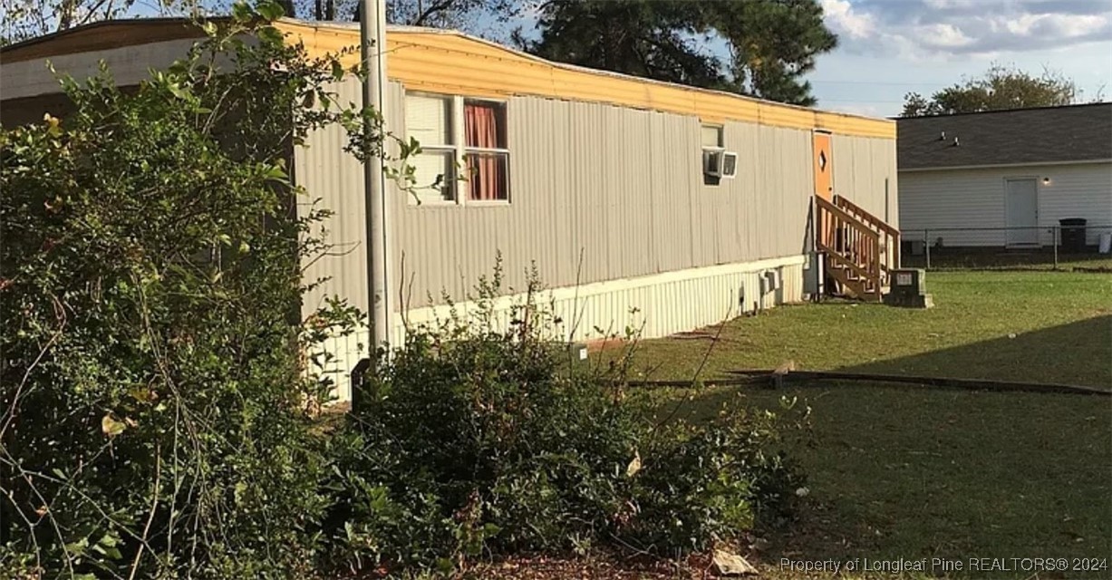 a view of a back yard of the house