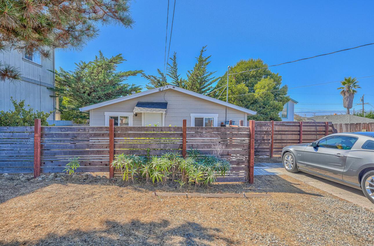 a house view with a backyard space