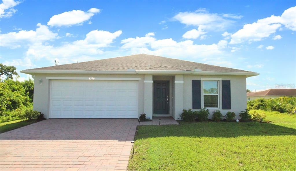 a front view of house with yard