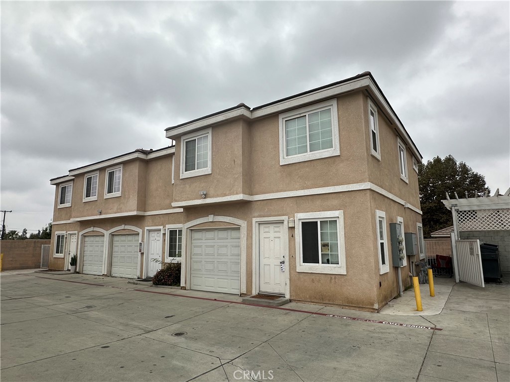 a front view of a house with a garage