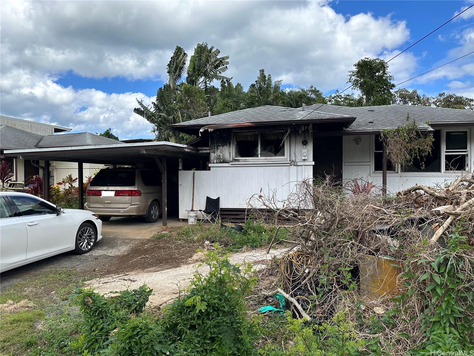 a view of a car in front of a house